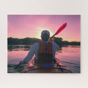Puzzle Randonnée en kayak sur le lac au coucher du soleil