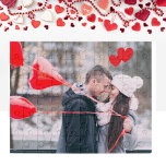 Puzzle Romantique Saint Valentin Couple Red Heart Ballons<br><div class="desc">Célébrez l'amour avec notre puzzle photo personnalisée enchanteresse avec un couple s'embrassant sur une pièce de puzzle vibrante, entourée de ballons de coeur rouge romantique. Ce design enchanteur saisit l'essence de la Saint-Valentin, ce qui en fait le cadeau idéal pour les couples qui chérissent leurs moments spéciaux ensemble. Personnalisez-le avec...</div>