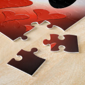 Puzzle Rouge sur les coeurs noirs (Côté)