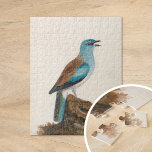 Puzzle Rouleau à grain | William Lewin<br><div class="desc">Rouleau grasse (avant 1790) | Le Garrulous Roller de William Lewin est un tableau vibrant et méticuleusement détaillé, qui présente un brillant rouleau brun et turquoise perché sur un rondin contre un arrière - plan neutre minimaliste. L’artiste saisit de manière magistrale le plumage et la position de l’oiseau, mettant en...</div>