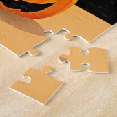Puzzle Sorcière adorable tenant une citrouille (Côté)