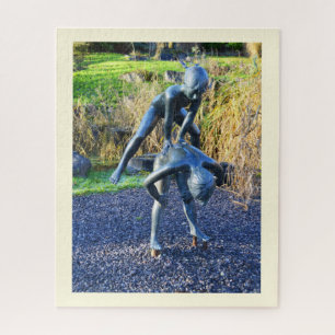 Puzzle Statue de deux enfants jouant