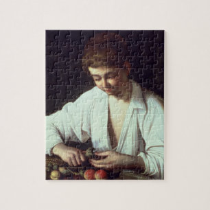 Puzzle T31971 un jeune garçon épluchant Apple