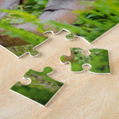 Puzzle Tigre Adulte Prowling Parmi Les Feuilles Vert Clai (Côté)