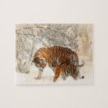 Puzzle Tigre avec petit dans la neige<br><div class="desc">Petit tigre jouant avec sa mère dans la neige.</div>