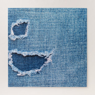Puzzle Tissu en denim déchiré, teintes bleues.