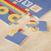 Puzzle Train de jouets portant des blocs d'alphabet (Côté)