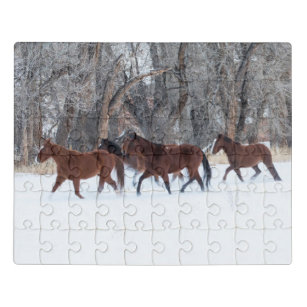 Puzzle Troupeau de chevaux qui courent en hiver neige