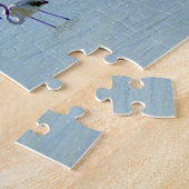 Puzzle Troupeau gris et rose de flamants dans le lac (Côté)