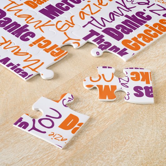 Puzzle Typographie multilingue Merci Orange violet (Côté)