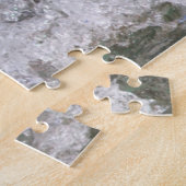 Puzzle Un bébé phoque surfant (Côté)