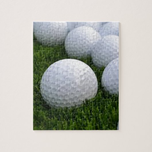 Puzzle Un bon nombre de boules de golf sur l'herbe (Vertical)