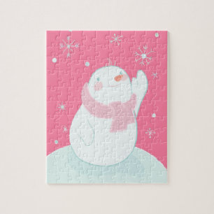 Puzzle Un bonhomme de neige atteignant pour un flocon de