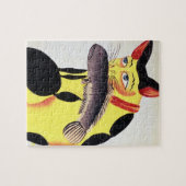 Puzzle Un chat avec un poisson dans sa bouche, du Rudyard (Horizontal)