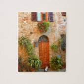 Puzzle Un chat cherche l'entrée chez lui à Pienza, en Ita (Vertical)