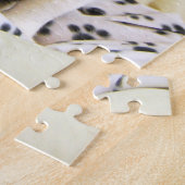 Puzzle Un chat de smoking colle sa langue (Côté)