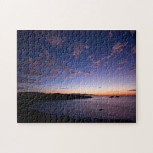 Puzzle Un coucher du soleil au-dessus de l'océan en le