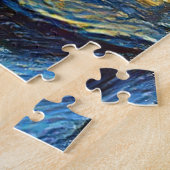 Puzzle un monde qui dort, dans les bras de l'amour. (Côté)