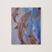 Puzzle Un morceau de dauphins de saut (Vertical)