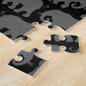 Puzzle Un objet superflu dans un troupeau (Côté)