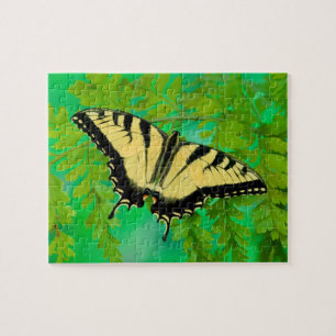 Puzzle Un papillon swallowtail atterrissant