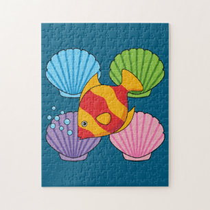 Puzzle Un poisson tropical orange et des coquilles coloré