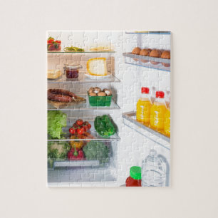 Puzzle Un réfrigérateur ouvert rempli de nourriture