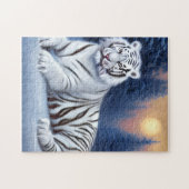 Puzzle Un tigre blanc assis dans la neige (Horizontal)