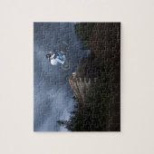 Puzzle Un VTT saute d'un cabine en rondins dans l'Idaho. (Vertical)