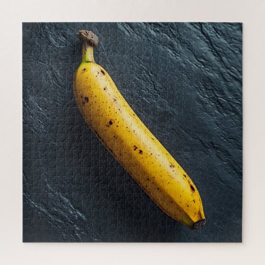 Puzzle Une banane sur une surface sombre (Vertical)