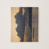 Puzzle Une équipe de canoë se pratique au large des côtes (Vertical)