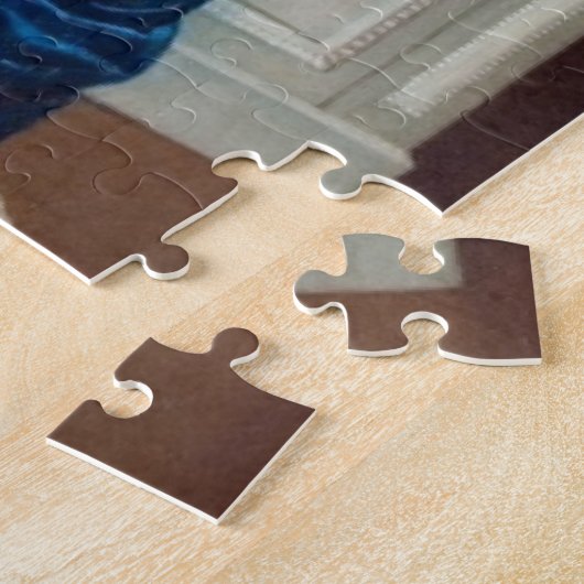 Puzzle Une femme en bleu, lisant un livre (Côté)