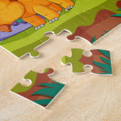 Puzzle Une jolie illustration de dinosaures dans une jung (Côté)