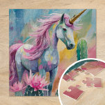 Puzzle Unicorne Abstraite lunatique et succulents<br><div class="desc">Un tableau abstrait moderne représentant une licorne géante entourée de cactus pastel et de succulents. La licorne, peinte dans des lignes fluides et des couleurs vives, se distingue par les tons doux des roses rousses, des verts menthe et des bleus pâles des plantes du désert. Cette composition ludique et imaginative...</div>