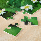 Puzzle Vache laitière rouge et blanche dans une patte de  (Côté)