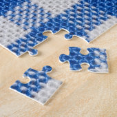 Puzzle Vêtements de table recouverts de blanc bleu. (Côté)