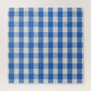 Puzzle Vêtements de table recouverts de blanc bleu.