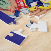 Puzzle Vieille femme néerlandaise de nettoyage (Côté)