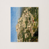 Puzzle Ville de la colline provinciale brille dans la lum (Vertical)