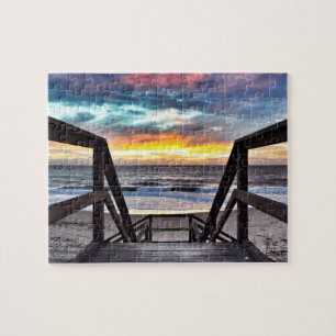 Puzzle Vue de la plage au coucher du soleil depuis une te