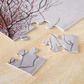 Puzzle Winter snow scene with cute black and tan dog (Côté)