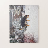 Puzzle Winter snow scene with cute black and tan dog (Vertical)