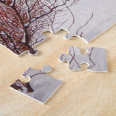 Puzzle Winter snow scene with cute black and tan dog (Côté)