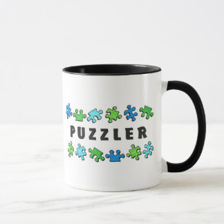 Puzzler met puzzelstukjes mok