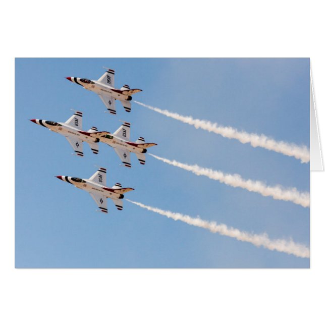Quatre F-16 Thunderbirds volent en formation rappr (Devant horizontal)