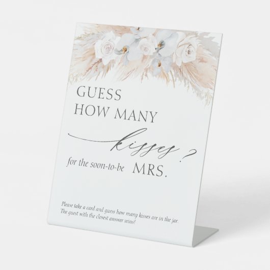 Raad eens hoeveel Kisses Pampas Grass Game Reclamebord Met Voetstuk (Voorkant)