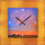 Rainbow orange coucher de soleil ciel paysage phot<br><div class="desc">Appréciez la beauté de la nature chaque fois que vous regardez l'heure sur cette horloge murale photographique d'un arc-en-ciel niché dans un coucher de soleil bleu, rose et orange doux. Vous avez le choix entre un visage rond ou carré. Fait un grand cadeau de ménage! Vous pouvez facilement personnaliser cette...</div>