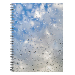 Raindrops op het venster notitieboek