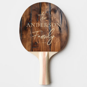 Raquette De Ping Pong Bois foncé verni avec nom de famille écrit à la ma