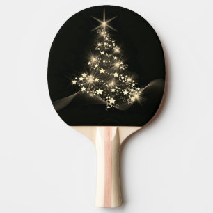 Raquette De Ping Pong Éclat doré des étoiles sur l'arbre de Noël sombre